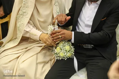 مراسم عقد زوجین جوان در جوار حرم مطهر حضرت شاهچراغ علیه السلام، به‌مناسبت میلاد خجسته مولود کعبه