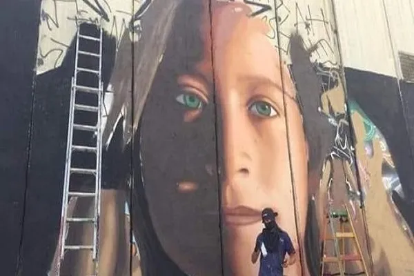 الاحتلال الاسرائيلي يعتقل رسامين إيطاليين رسما جدارية لعهد التميمي