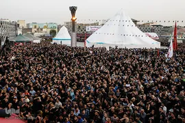 مراسم خیمه سوزان عصر عاشورا در میدان امام حسین (ع) تهران
