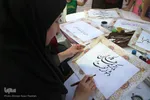بداهه‌نويسی خوشنويسان شيرازی در جشن ميلادامام رضا(ع)