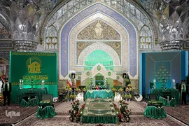 آیین تعویض پرچم گنبد منور رضوی در روز میلاد امام رضا(علیه‌السلام)