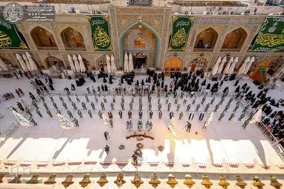 تعویض پرچم حرم حضرت علی(ع)
