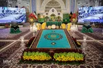 آیین تعویض پرچم گنبد حرم امام رضا(ع)
