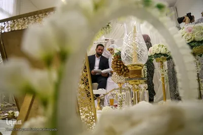 مراسم عقد ازدواج جمعی از جوانان در آستان شاهچراغ به‌ مناسبت عید غدیر