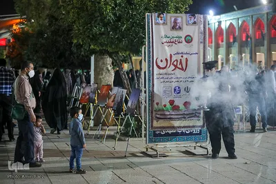 برپایی نمایشگاه عکس به مناسبت هفته دفاع مقدس در حرم مطهر شاهچراغ(ع)