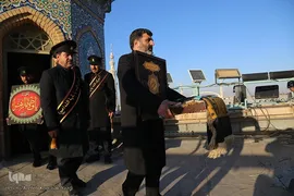 آیین تعویض پرچم گنبد آستان مسجد مقدس جمکران در آستانه ایام فاطمیه