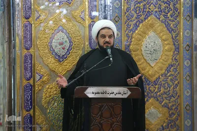 تعویض پرچم گنبد حرم رضوی در آغاز ماه محرم