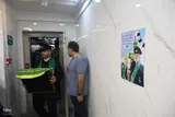 پرچم متبرک امام رضا در مرکز ناباروری جهاد دانشگاهی قم