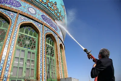 آئین شستشو وتعویض پرچم گنبد مسجد مقدس جمکران