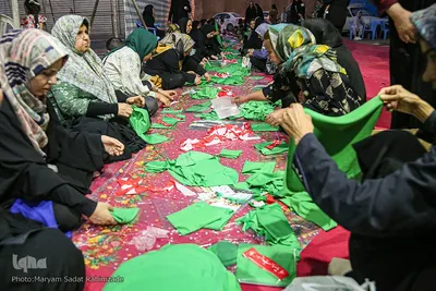آماده‌سازی لباس همایش جهانی شیرخوارگان حسینی