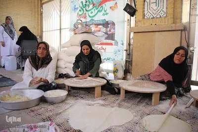 پخت نان سنتی صلواتی در حرم شاهچراغ(ع)‎‎