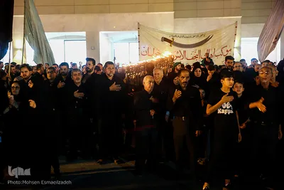 آیین مشعل گردانی نجفی‌های مقیم مشهد در شب تاسوعا‎
