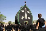 آیین نخل گردانی ظهر عاشورا در شاهدیه یزد