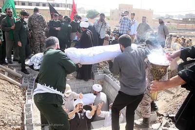 تشییع پیکرهای پاک و مطهر دو شهید گمنام دوران دفاع مقدس در مجتمع فرهنگی ورزشی فجر سپاه اهواز