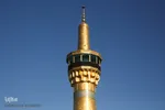 تعویض پرچم گنبد حرم امام رضا(ع)
