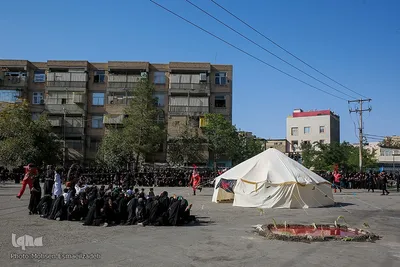 مراسم آیینی تعزیه خوانی و خیمه سوزان در مشهد
