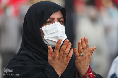 مراسم تعویض پرچم گنبد حرم حضرت شاهچراغ (ع)