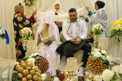 مراسم عقد زوجین در جوار حرم حضرت شاهچراغ(ع)